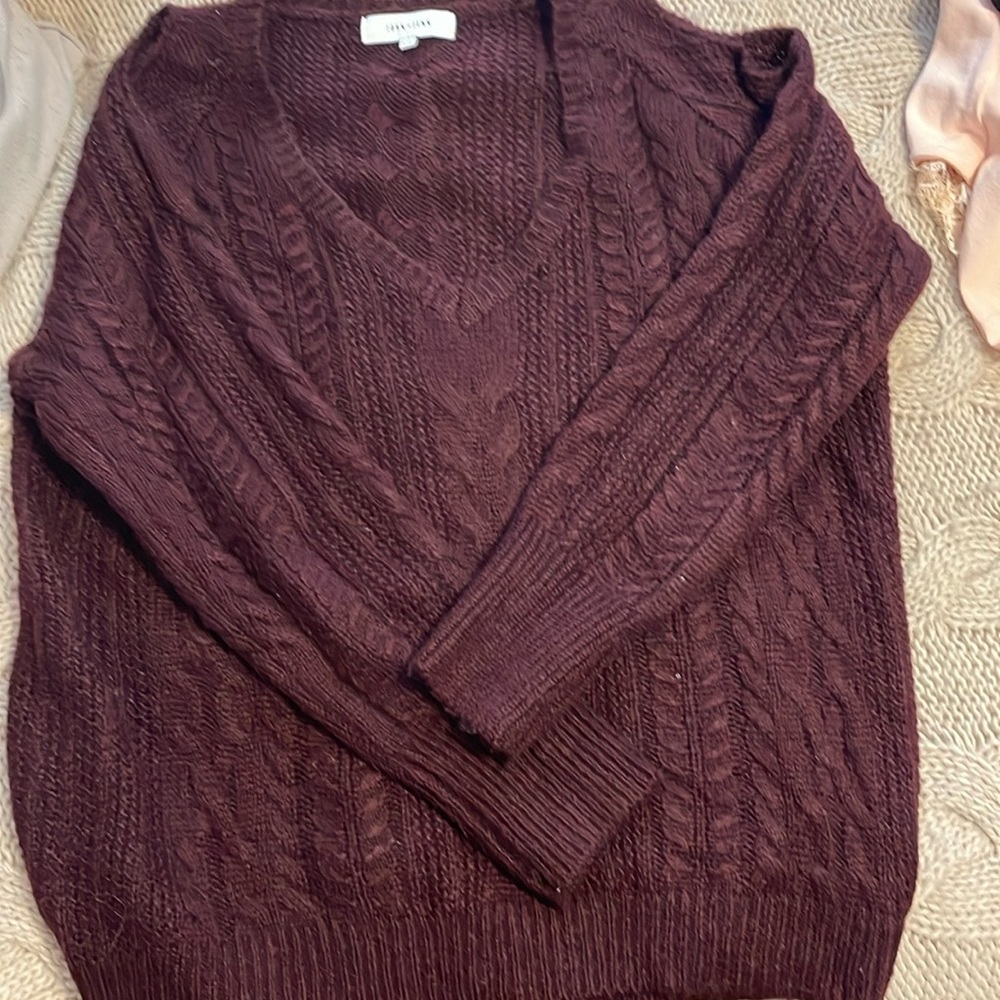 Maroon colored sweater